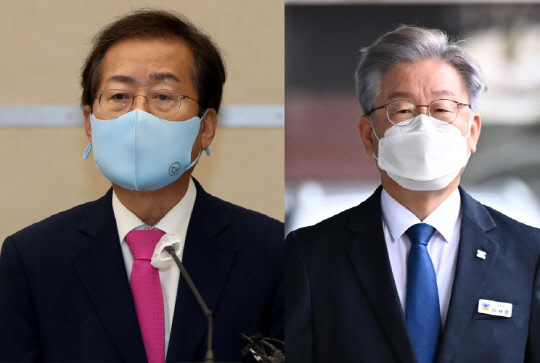 국민의힘 대선주자인 홍준표 의원과 더불어민주당 대선후보인 이재명 경기지사. 연합뉴스